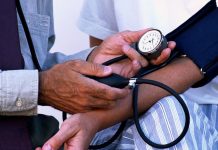 Checking blood pressure to detect hypertension early using a digital monitor