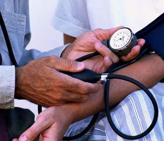 Checking blood pressure to detect hypertension early using a digital monitor