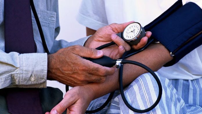 Checking blood pressure to detect hypertension early using a digital monitor